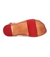 A pair of Hera women's shoes by Bed Stu with a red and brown stripe.