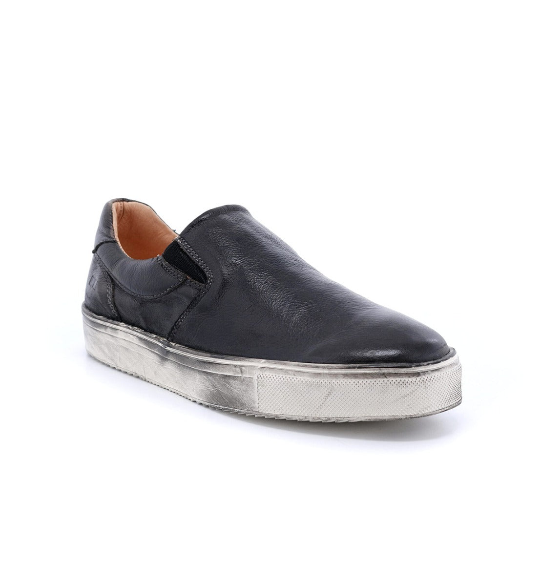 A black leather slip on sneaker with silver soles, called Hermione by Bed Stu.