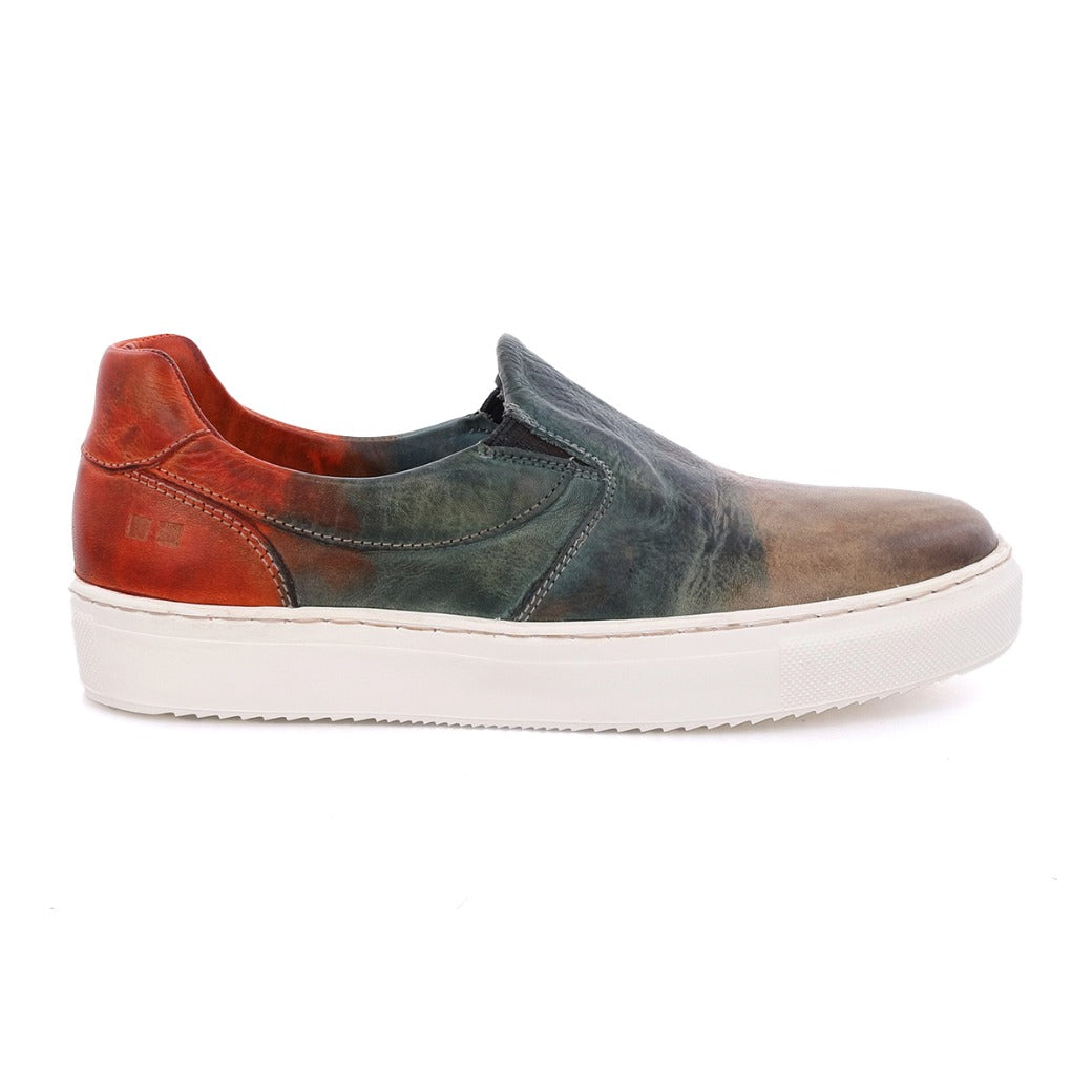 A pair of women's slip on sneakers with a multi-color dye, called Hermione from the brand Bed Stu.