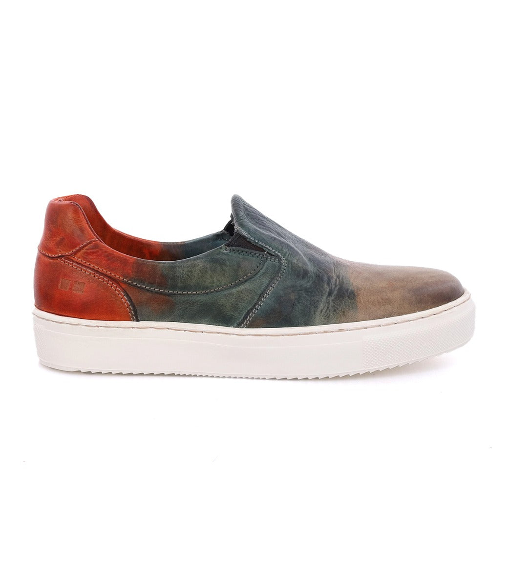A pair of women's slip on sneakers with a multi-color dye, called Hermione from the brand Bed Stu.