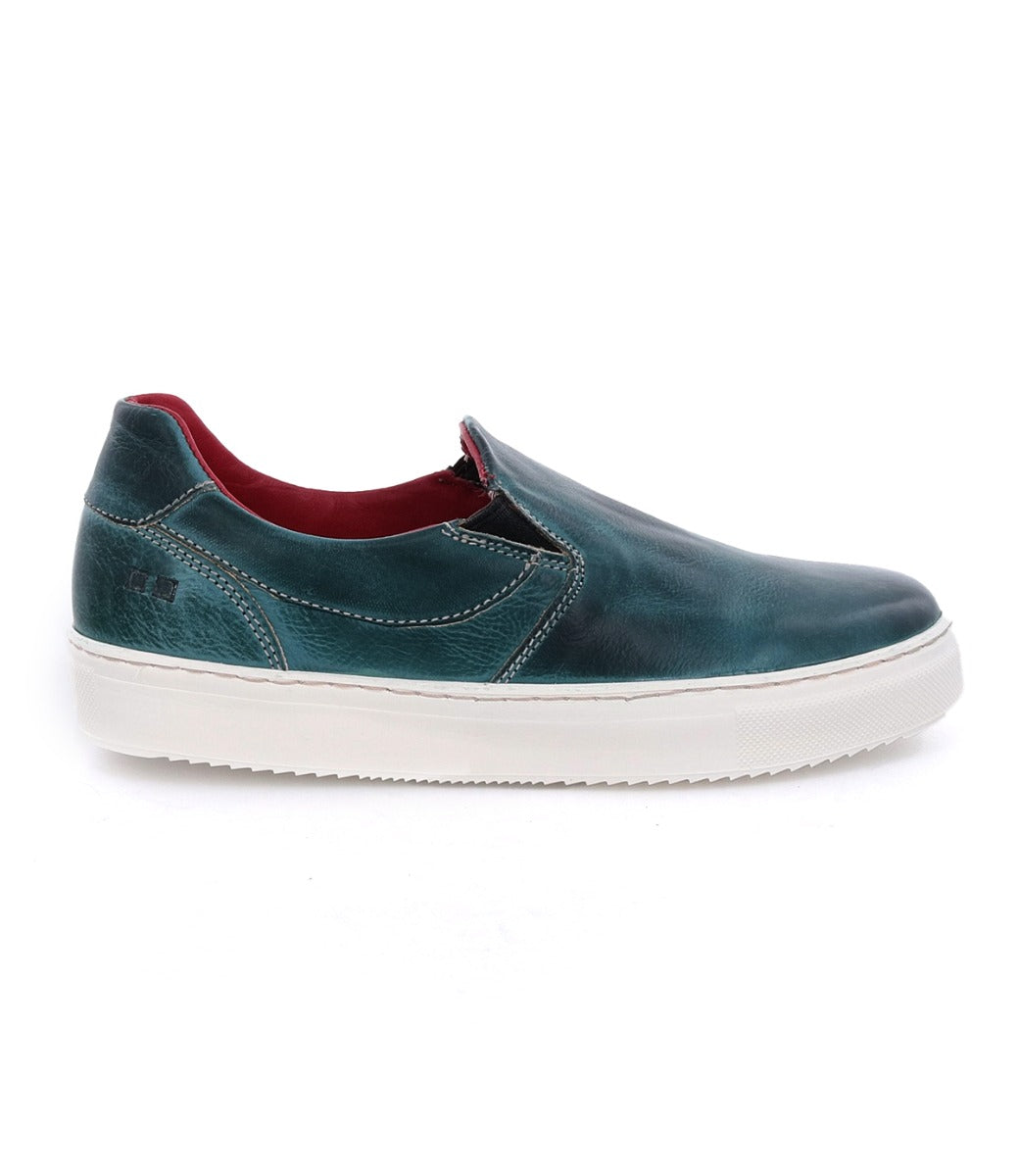 A women's blue slip on sneaker with a white sole named Hermione by Bed Stu.