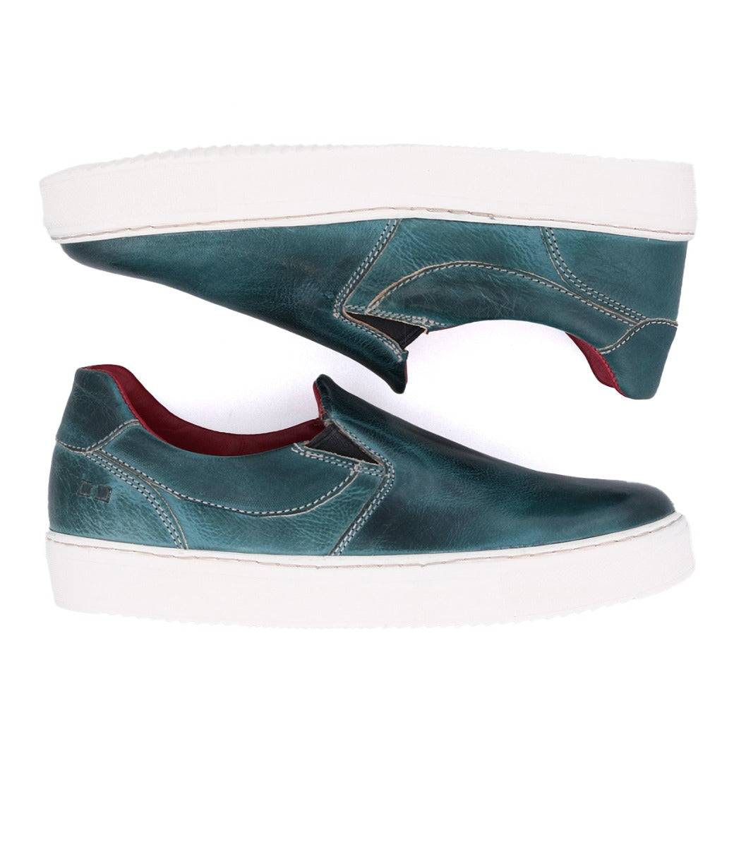 A pair of Hermione green leather slip on sneakers from Bed Stu.
