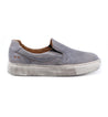 A grey slip on sneaker named Hermione by Bed Stu with a white sole.