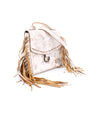 A Bed Stu Hidden white leather crossbody bag with fringes.
