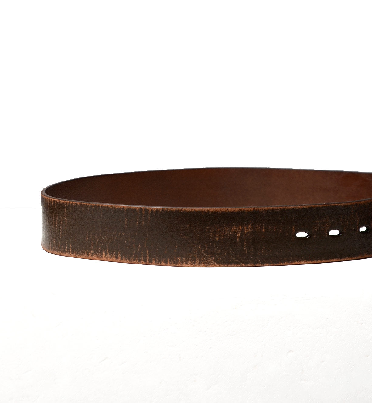 A Hobo brown leather belt on a white background by Bed Stu.