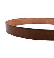 A Hobo brown leather belt on a white background, by Bed Stu.