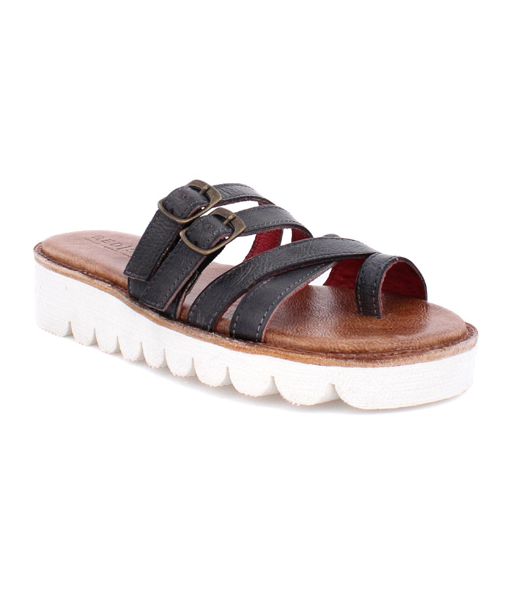 A women's black Holland sandal with two straps and a white Bed Stu sole.
