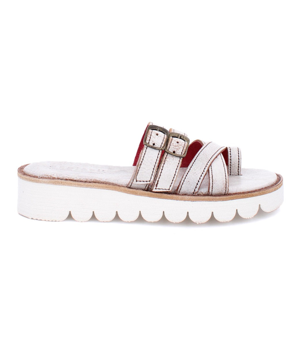 A women's white Holland sandal with two straps and two buckles by Bed Stu.