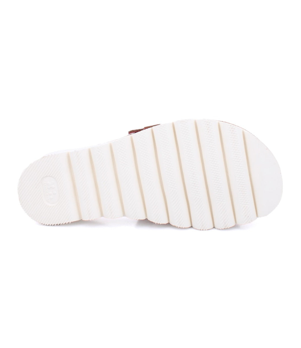 The sole of Bed Stu Holland women's sandals on a white background.