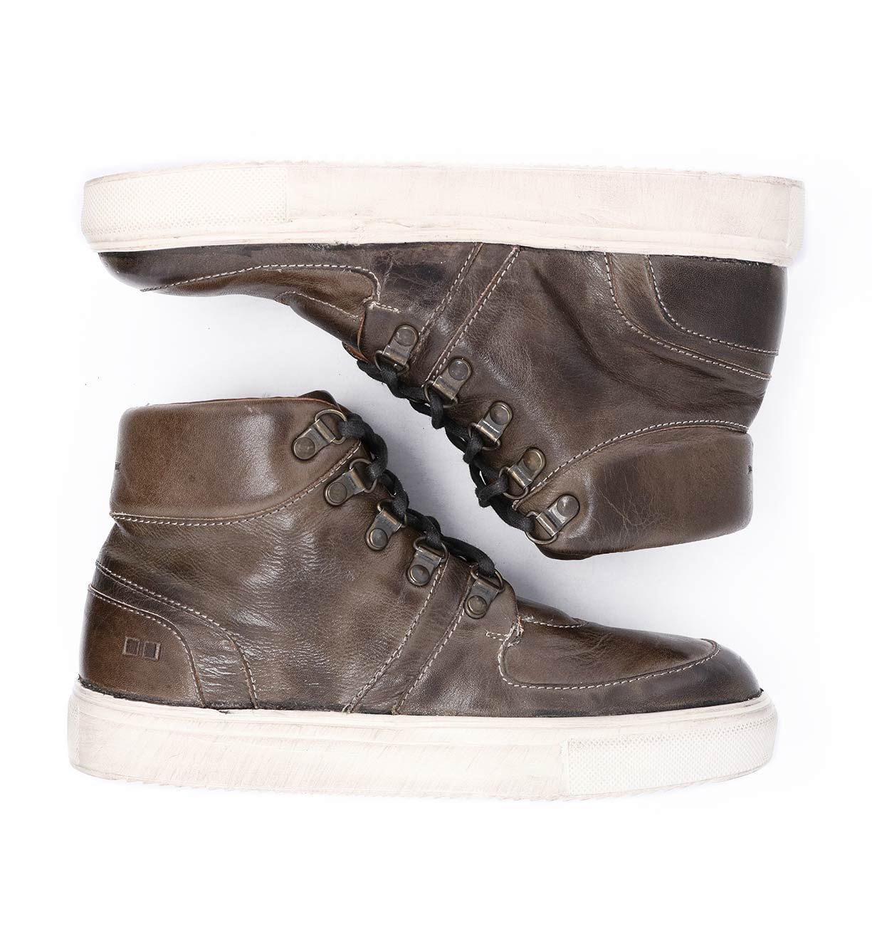A pair of brown leather Bed Stu Honor sneakers on a white background.