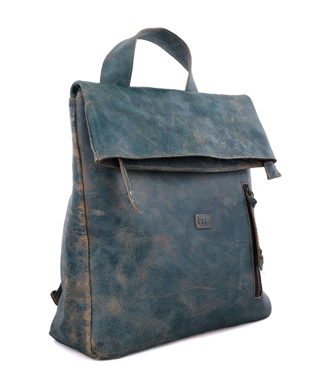 A Howie dark teal leather backpack with a zipper by Bed Stu.
