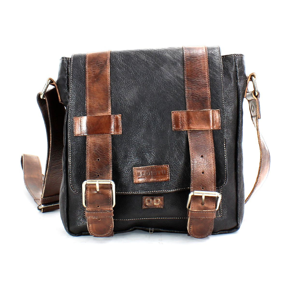 The Hue by Bed Stu is a versatile black leather messenger bag with brown leather straps, brass buckles on the front, and an adjustable shoulder strap.