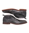 A pair of Illiad grey leather chukka boots by Bed Stu on a white background.