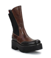 Introducing the Illicit by Bed Stu, a retro-inspired brown and black leather boot featuring a chunky platform sole and intricate stitching details.