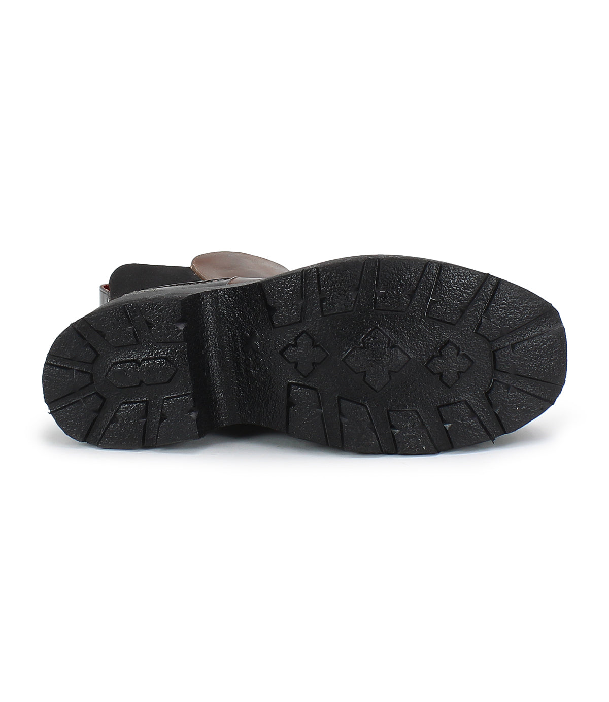 The Illicit platform ankle boot by Bed Stu, with its black rugged sole and intricate tread patterns, exudes a touch of retro flair when admired from below.