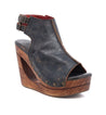 An Imelda women's wedge sandal with a wooden platform by Bed Stu.