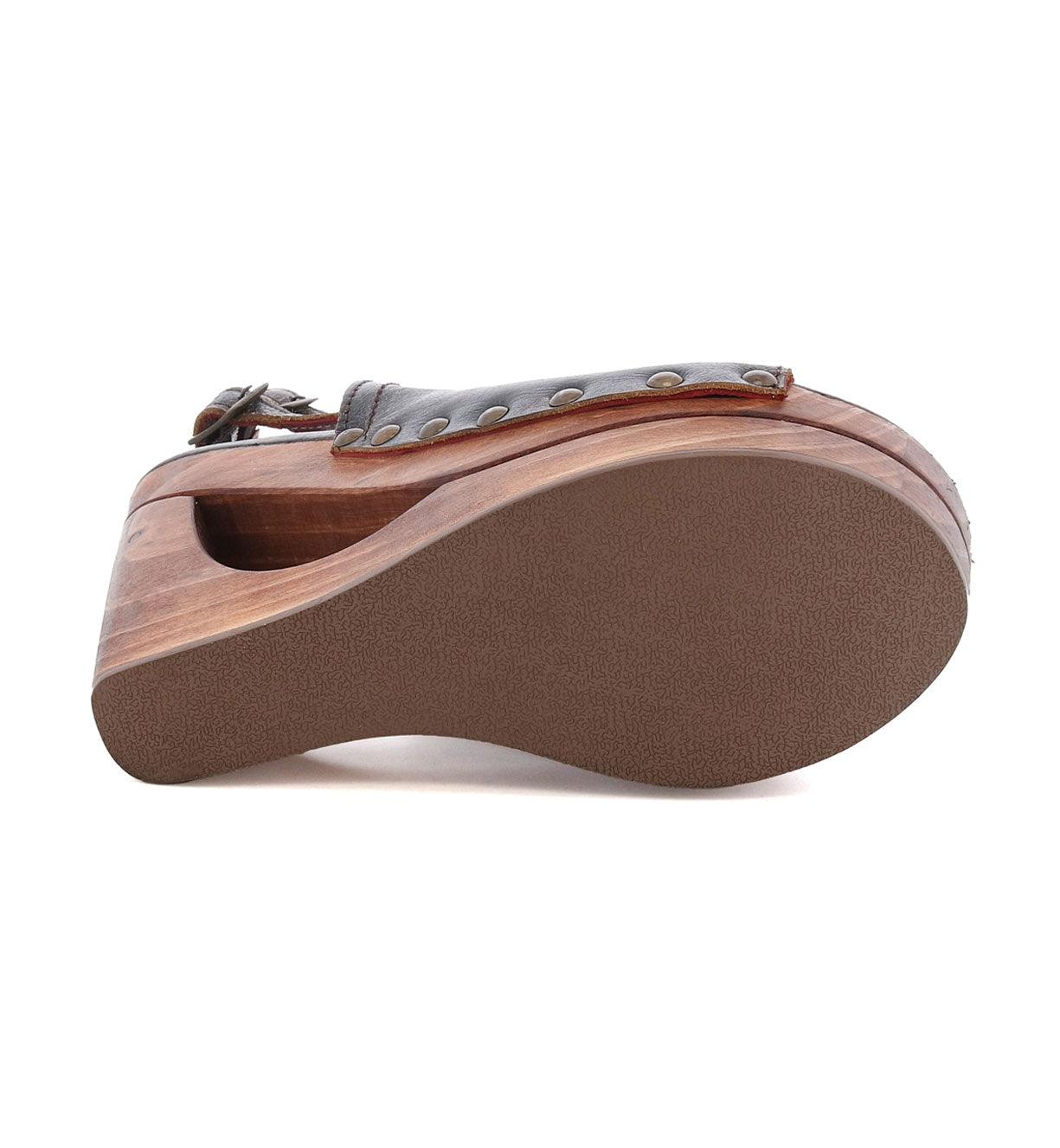 The back of an Imelda shoe with a wooden sole, Bed Stu.