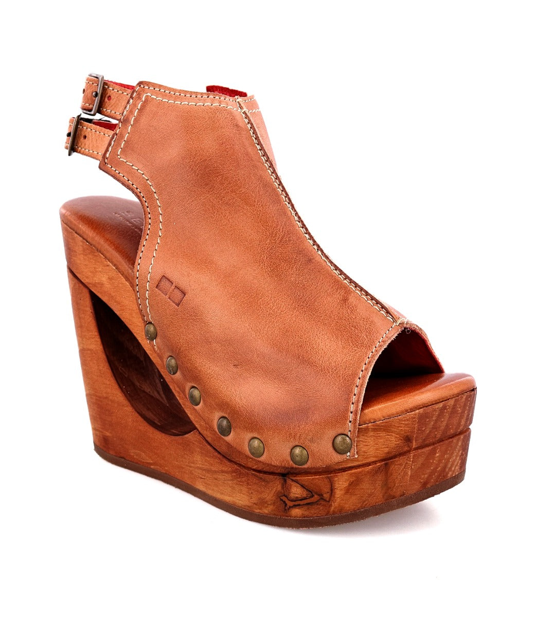 A women's Imelda wooden wedge sandal with a Bed Stu wooden platform.