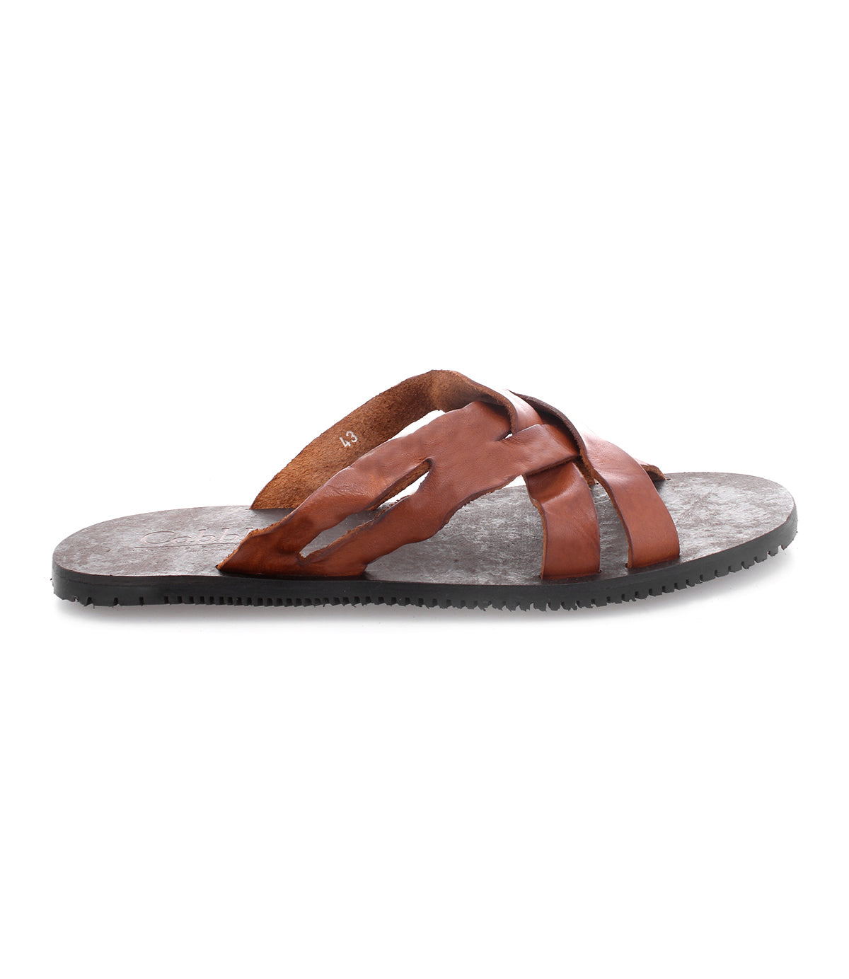 A pair of Impromptu sandals from Bed Stu, made of brown leather with woven leather straps, offering both casual style and comfort.