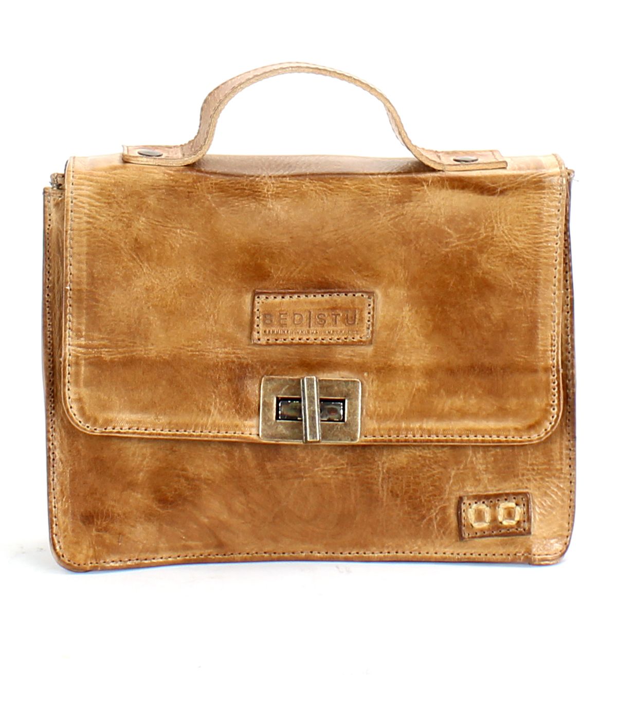 The Improv by Bed Stu is a brown leather satchel featuring a top handle, front buckle clasp, embossed brand name on the flap, and a handy crossbody strap for added fashion and functionality.