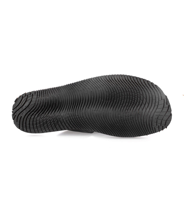 A pair of comfortable black rubber Bed Stu shoes on a white background.
