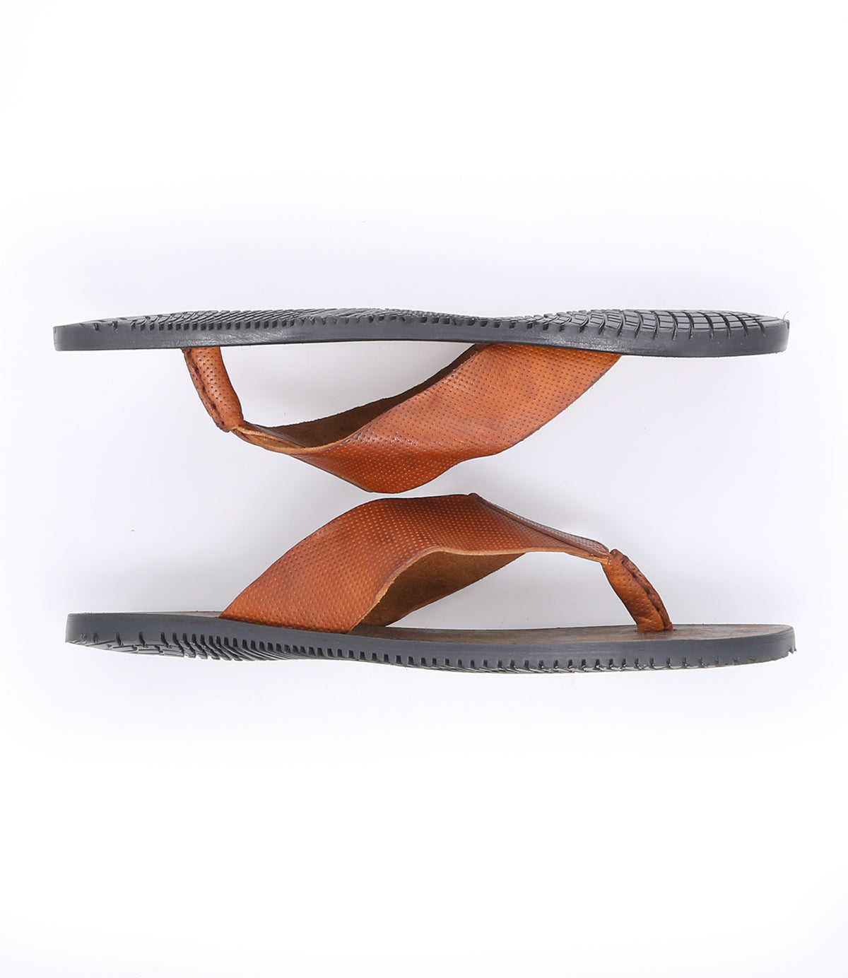 A pair of durable, brown leather Bed Stu slippers on a white background.