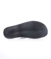 A pair of durable Bed Stu black flip flops on a white background.