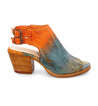 A pair of Bed Stu Ireni women's sandals with an orange and blue dye.