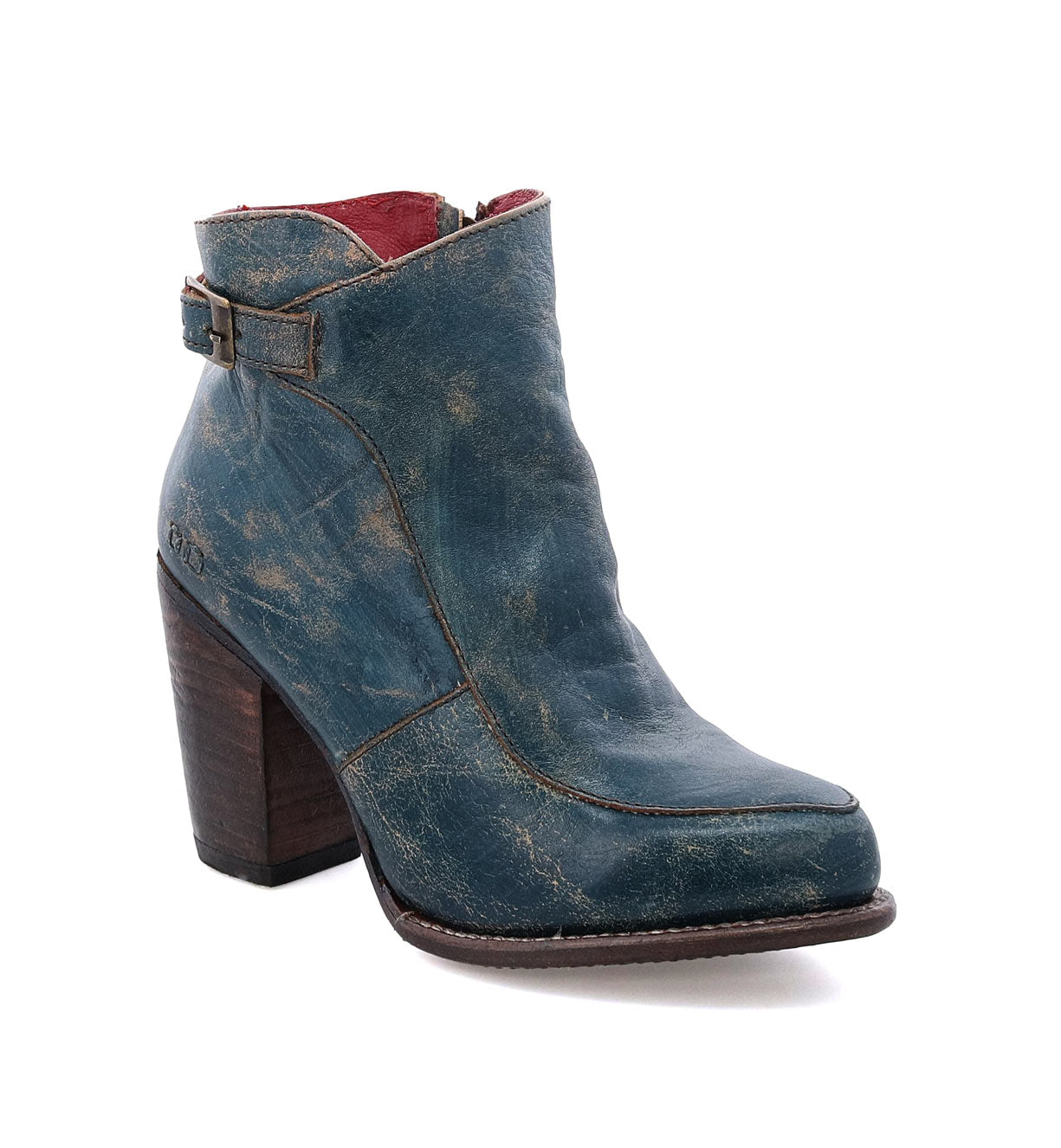 A women's Isla blue leather ankle boot by Bed Stu with a wooden heel.