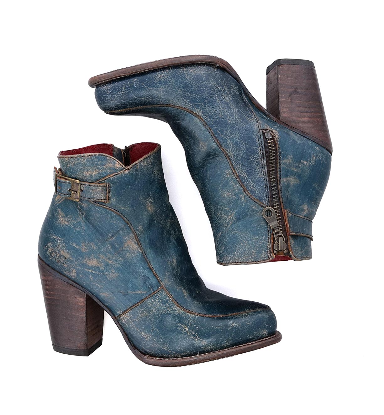 A pair of Isla blue leather ankle boots by Bed Stu with a wooden heel.