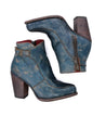 A pair of Isla blue leather ankle boots by Bed Stu with a wooden heel.