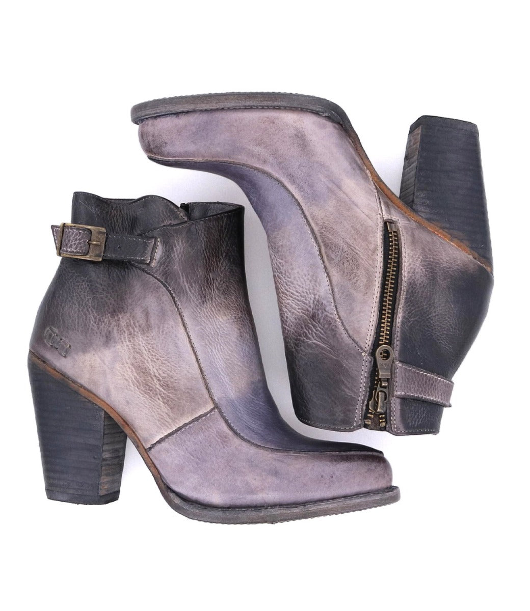 A pair of Isla grey leather ankle boots with a zipper by Bed Stu.