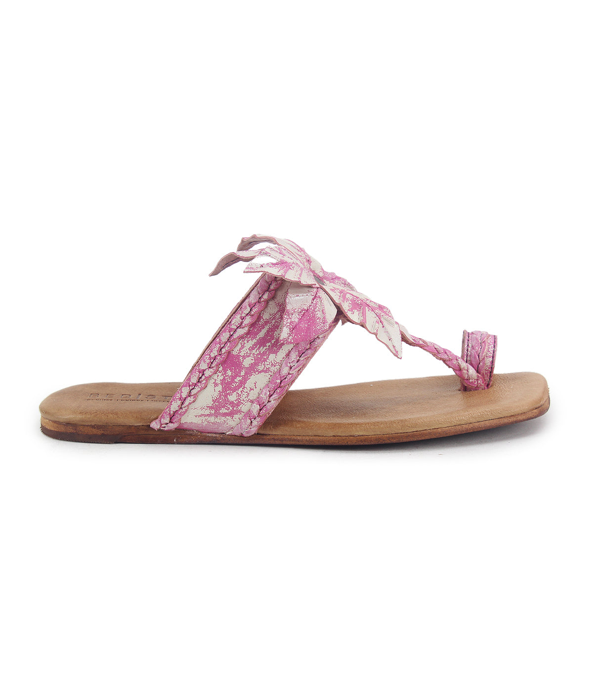The Isobel sandal by Bed Stu is pink and white marbled with a wooden sole, complete with a braided leather strap and leather flower embellishment on top.