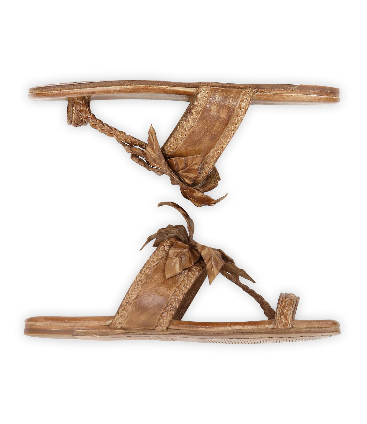 The Bed Stu Isobel sandals feature brown braided leather straps and decorative bows, displayed from the side against a white background.