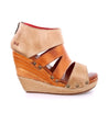 A women's wedge sandal, the Jacey II by Bed Stu, with tan and brown straps.