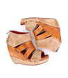A pair of Bed Stu Jacey II women's wedge sandals with tan and brown straps.