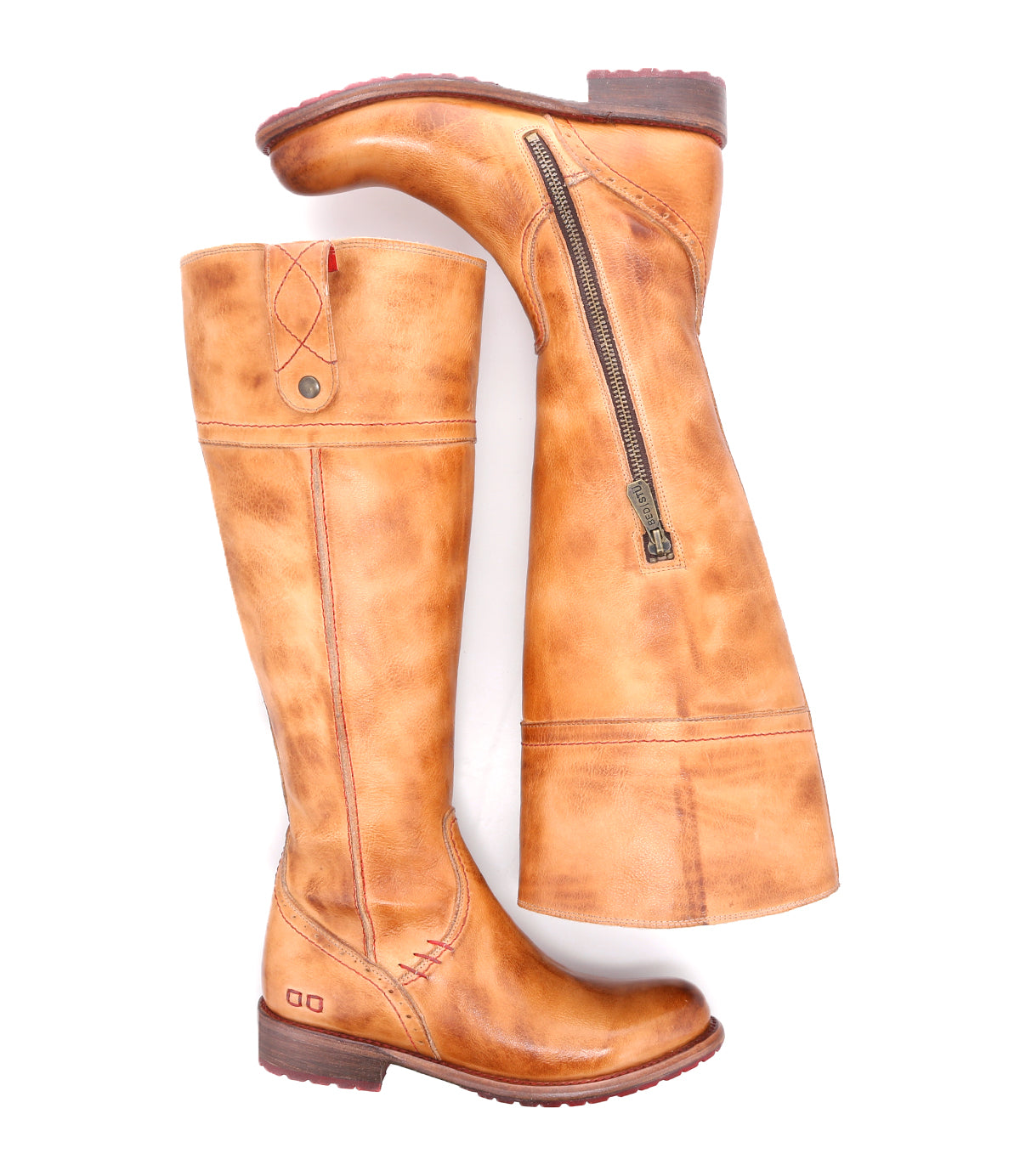 A pair of Bed Stu Jacqueline Wide Calf tall tan leather boots with zippers on the side.