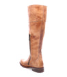 The Bed Stu Jacqueline Wide Calf is a stylish tan leather riding boot for women, designed to be tall and elegant.