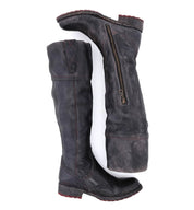 A pair of Jacqueline boots by Bed Stu with zippers on the side.