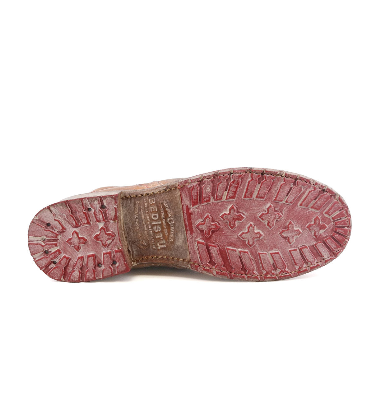 A pair of Jacqueline shoes with red soles on a white background by Bed Stu.