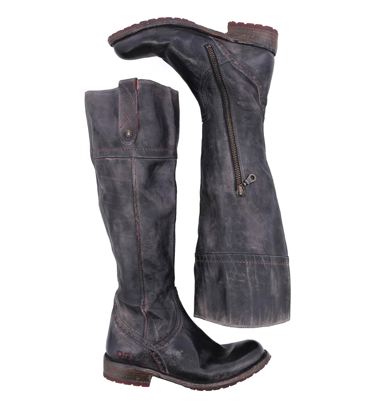 A pair of Jacqueline Wide Calf women's boots by Bed Stu with zippers on the side.