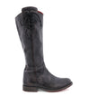 A women's Janina boot from Bed Stu, with a red sole.