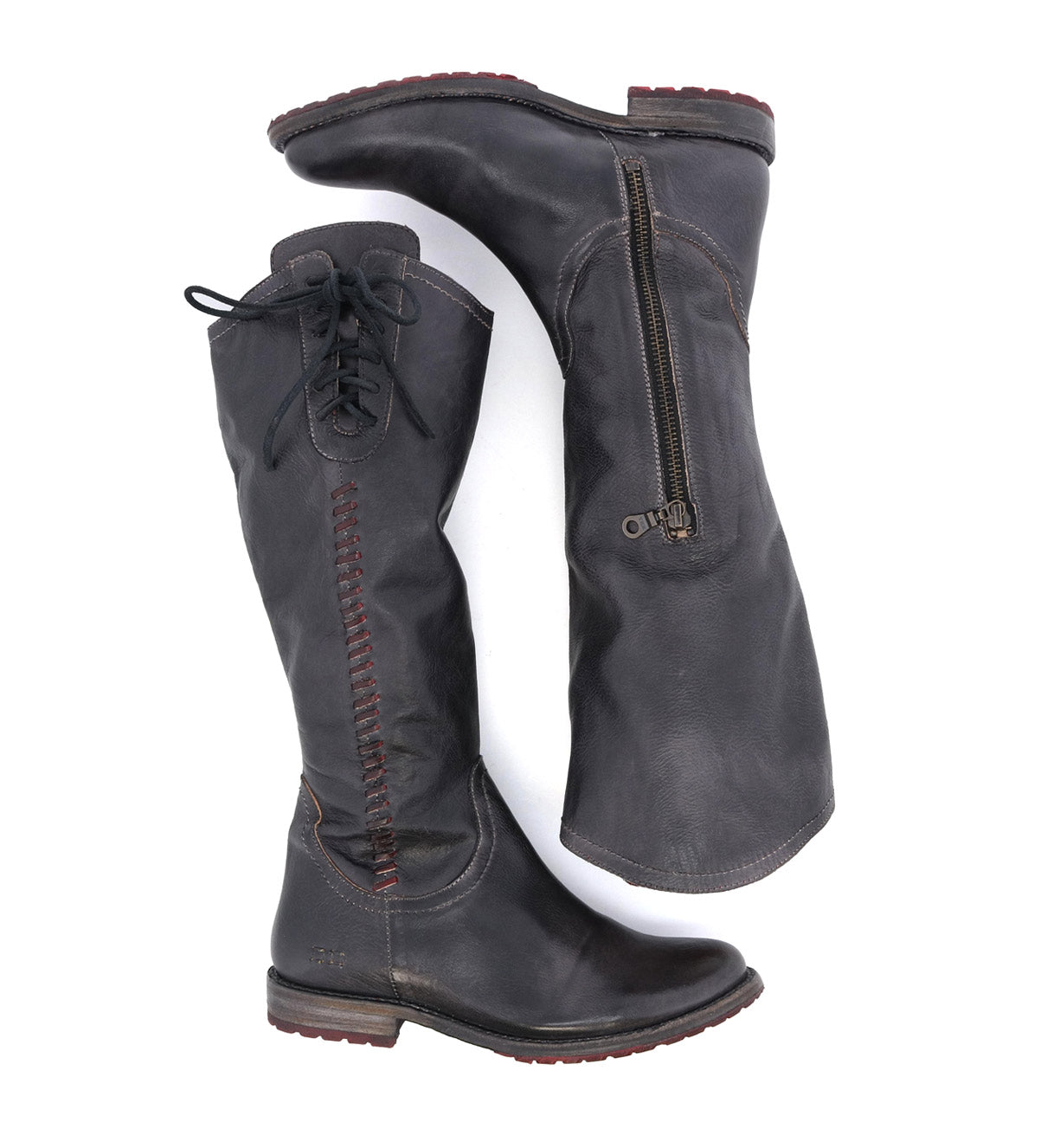 A pair of Janina boots with zippers on the side made by Bed Stu.