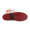 A pair of Janina shoes with red soles on a white background from Bed Stu.