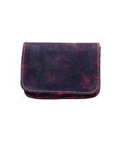 The Jeor by Bed Stu is a small, dark brown leather wallet with visible stitching and a simple, worn design, featuring credit card slots for added convenience.