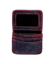 Image of an open, dark-colored leather Jeor wallet by Bed Stu, featuring multiple credit card slots and a clear ID holder.