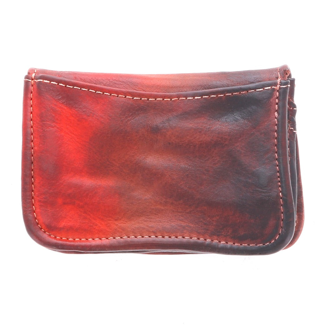 A red Jeor leather wallet on a white background by Bed Stu.
