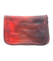 A red Jeor leather wallet on a white background by Bed Stu.