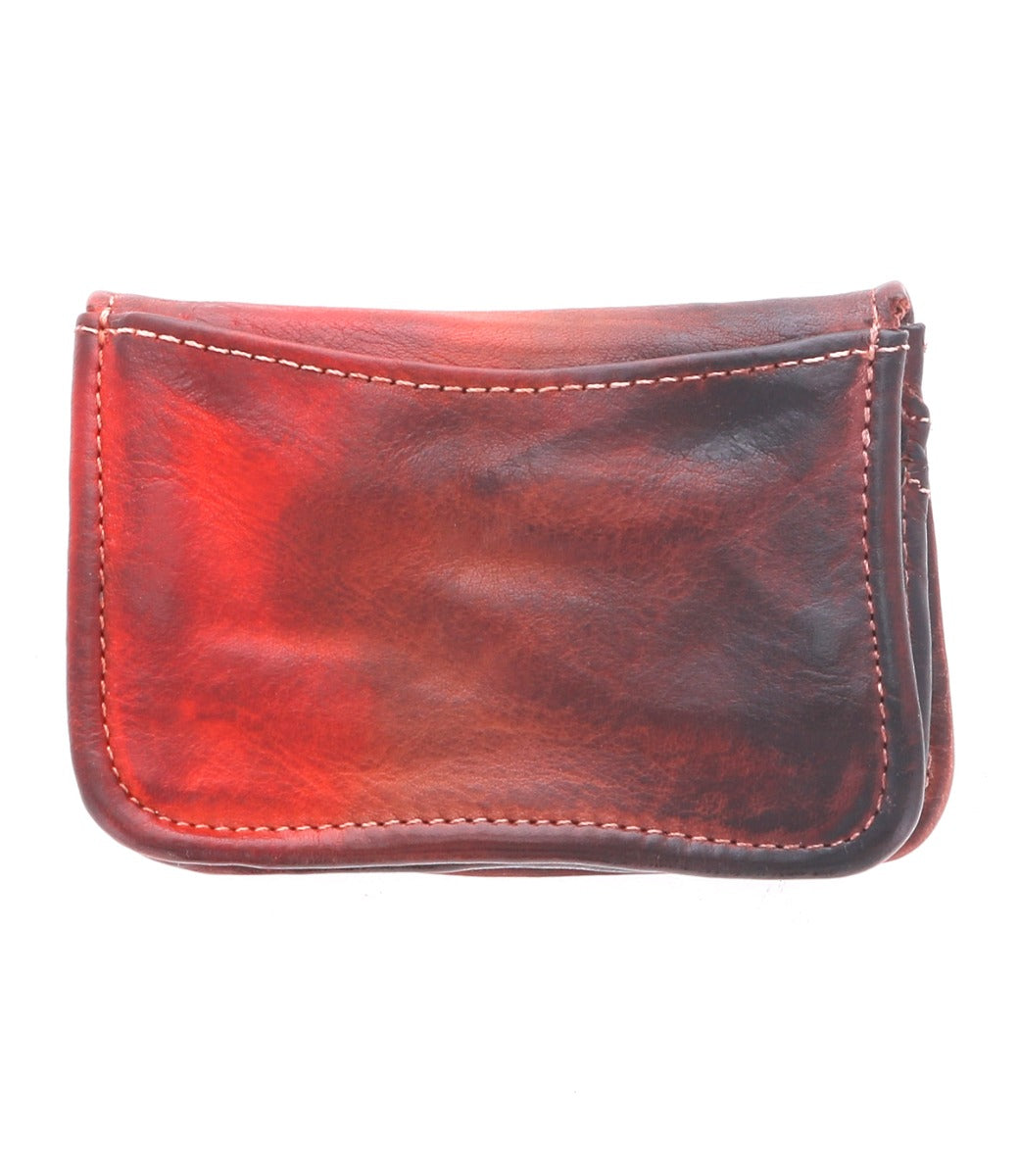A red Jeor leather wallet on a white background by Bed Stu.