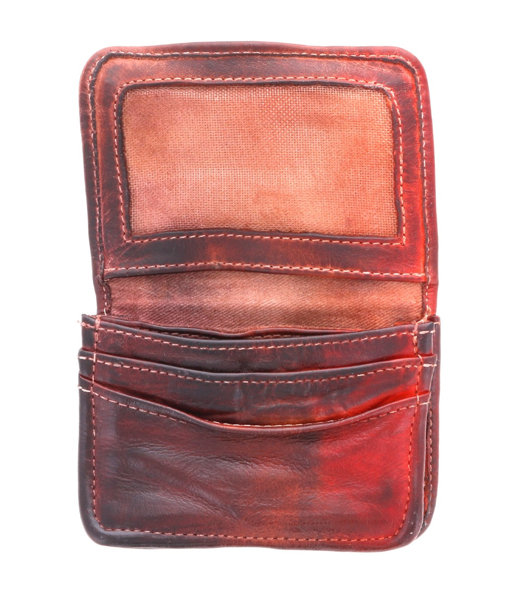 A red leather Jeor wallet with two compartments by Bed Stu.